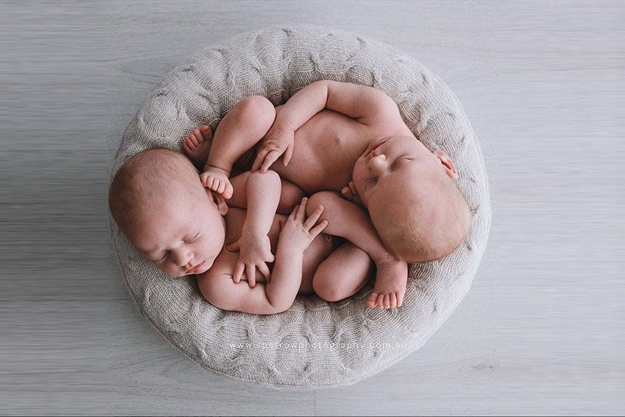 Newborn poser for twin photoshoot Europe