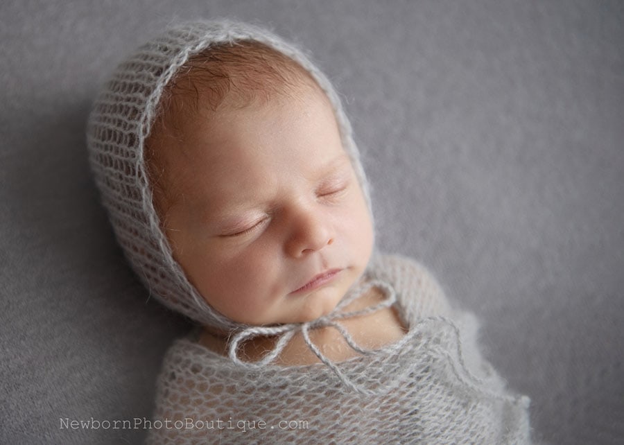newborn photoshoot ideas boy bean bag wrap hat