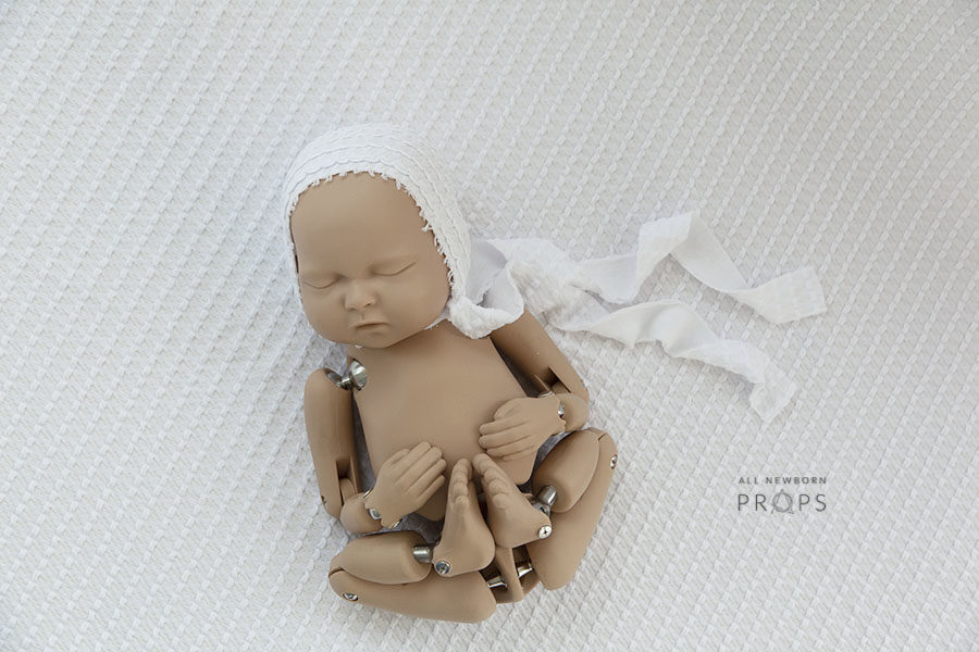 newborn-baby-bonnet-boy-white-textured-europe