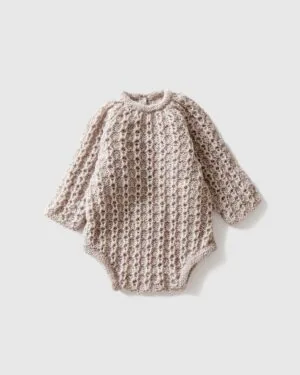 Flat lay of newborn photography romper Yona – front view