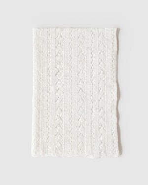 Folded view of cream Tobias wrap showing soft texture and neutral tone