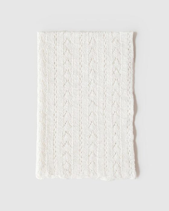Folded view of cream Tobias wrap showing soft texture and neutral tone