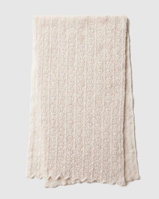Front view of oatmeal‑coloured newborn photography wrap Wade laid flat