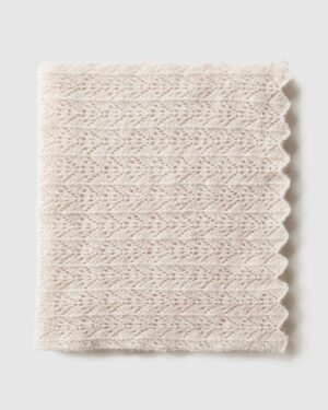 Oatmeal‑coloured newborn photography wrap Wade folded for flatlay image